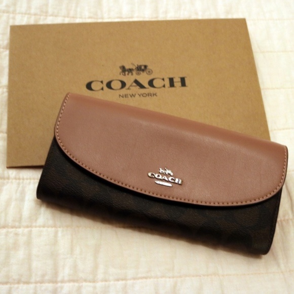 Coach Handbags - Coach envelope wallet in signature canvas